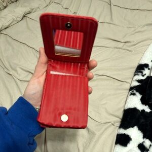 Red Case with Compact Design and Textured Surface